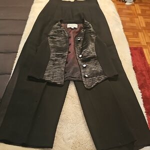 Giuseppe Black Tuxedo Suit with black  satin along the outer legs of pants.